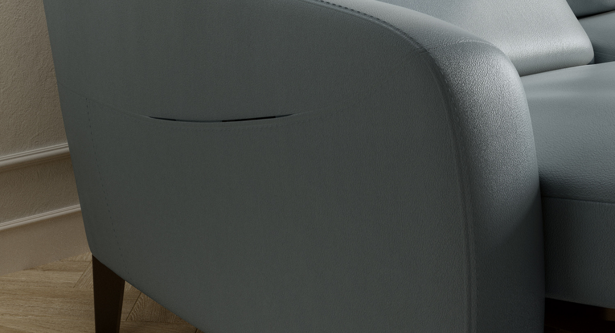 The fully upholstered pocket discreetly houses the switch panel, creating a clean and sophisticated design detail that elevates the overall aesthetic of the sofa. By concealing the controls within the armrest, the look remains refined and uninterrupted while still offering effortless accessibility. The integrated USB port within the panel provides convenient, at-hand device charging, ensuring modern functionality is seamlessly built into the piece.