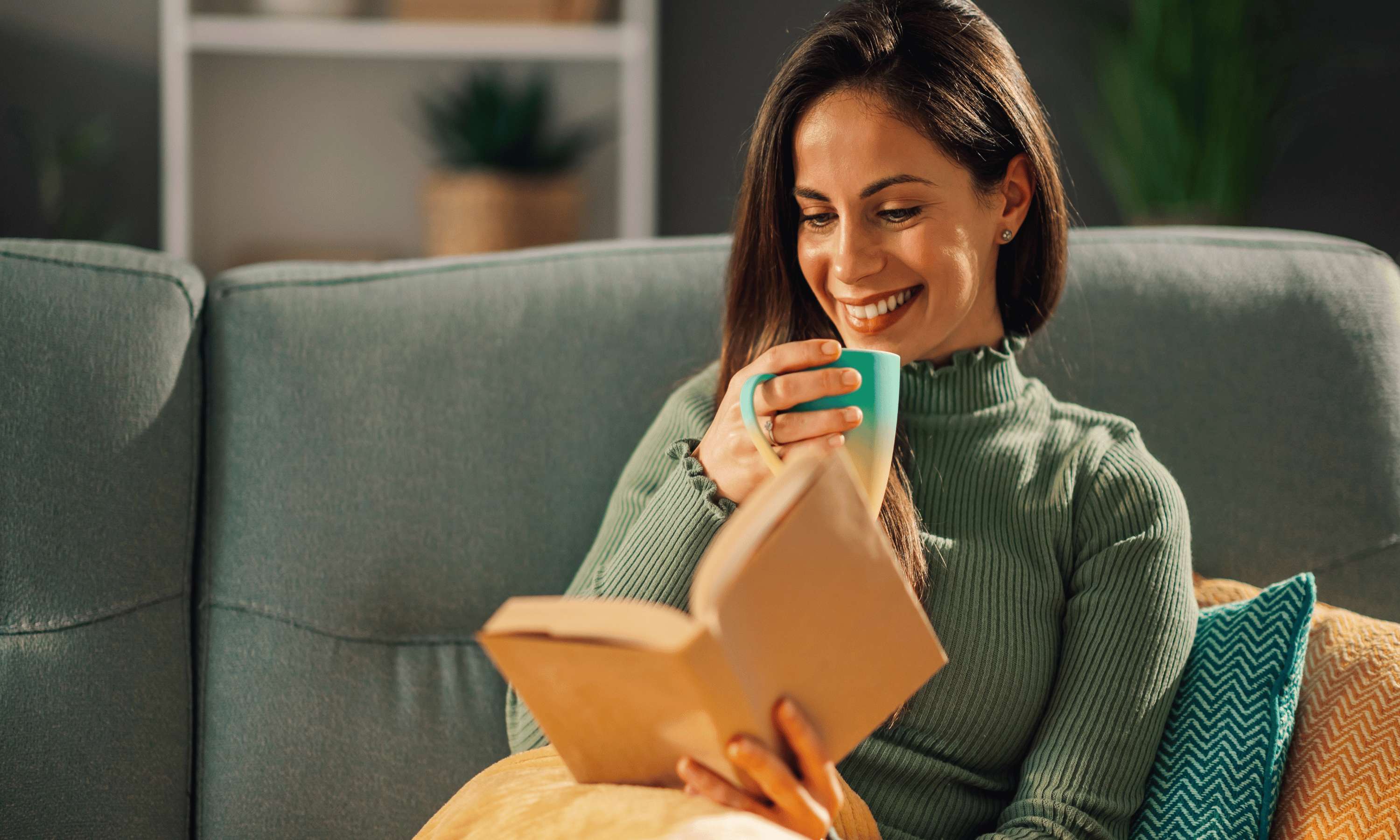 woman-with-a-hot-drink-reading-book---cookes-furniture